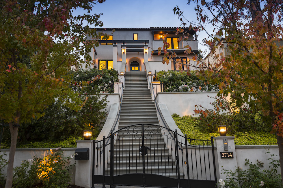  Front exterior approach at twilight 