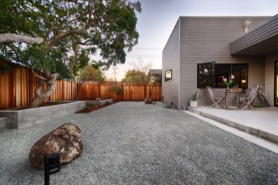  Backyard landscape, patio, and house 