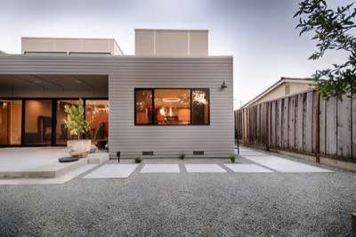  House featuring raised roof areas 